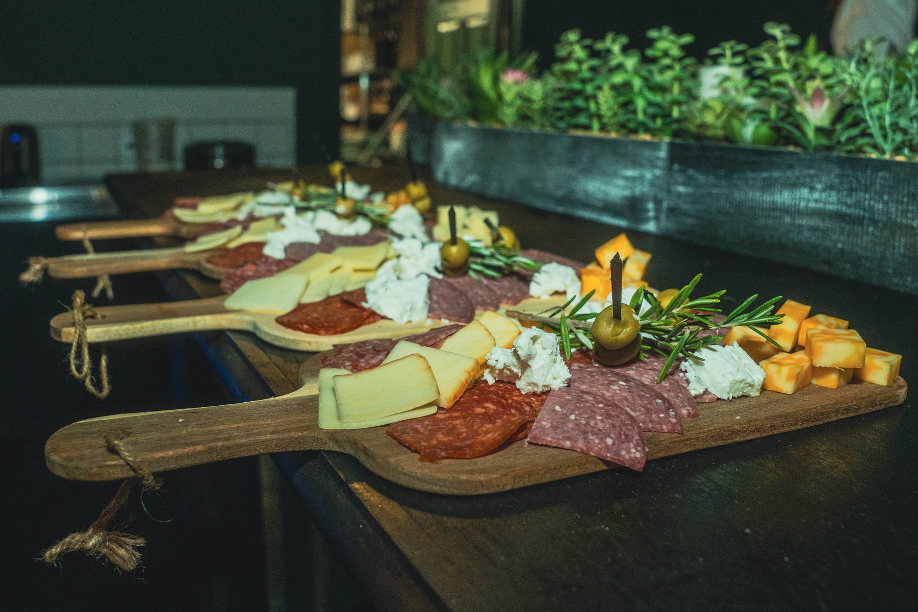 Charcuterie boards served alongside the bar